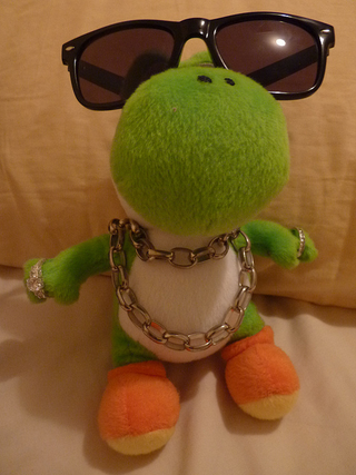 Illustration for article titled Is Yoshi A Raging Capitalist?